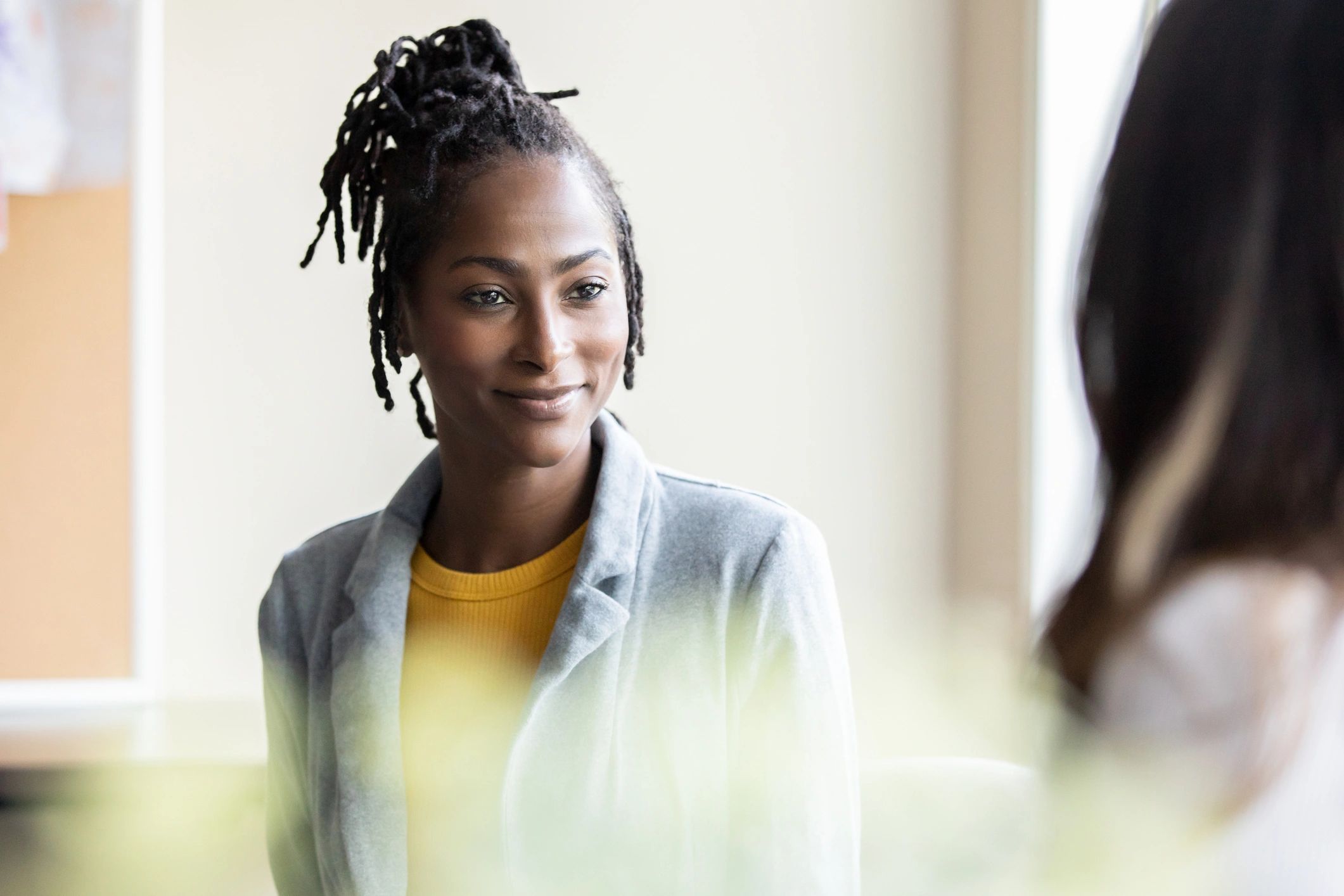 Teen student in a supportive learning conversation